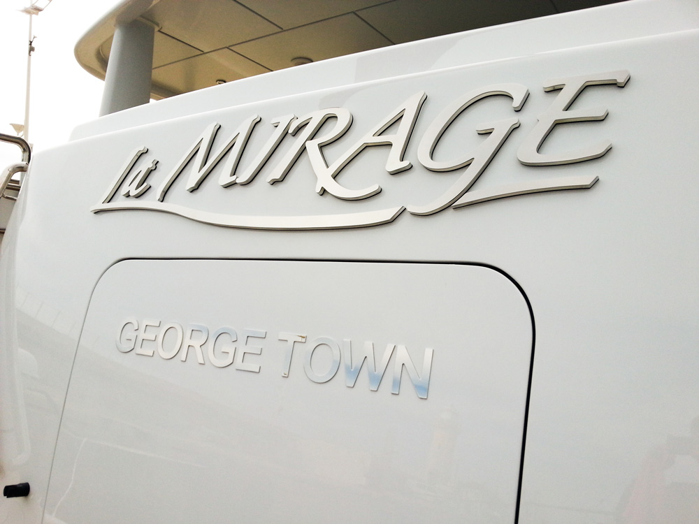 Chrome boat letters with George Town haling port.